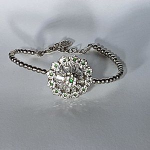 UNIQUE FLORAL BRACELET SIMULATED EMERALD AND WHITE TOPAZ STAMPED 925 STERLING